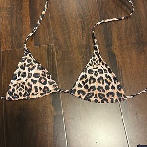Shein cheetah print bikini top, size XS, good condition.